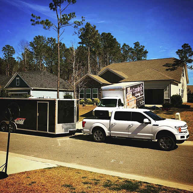 moving truck in front of house